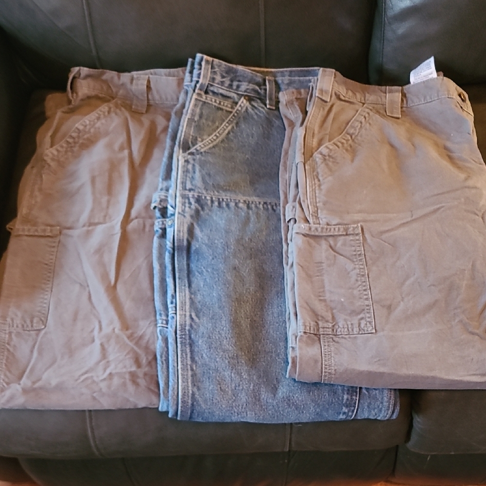 3 pair of gently used Carhartt work Pants. Demim pair are Dbl. front.